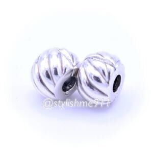 Two Authentic PANDORA Feathered Clips